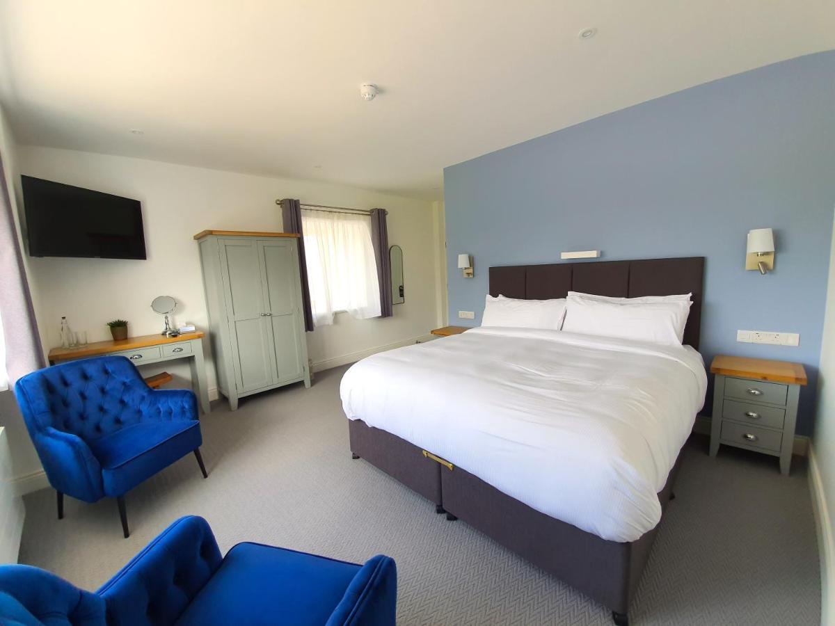 Dingle Garden Townhouse Bed and Breakfast Eksteriør billede A bedroom at The Old Mill